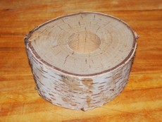 Dřevěný stojánek špalek
